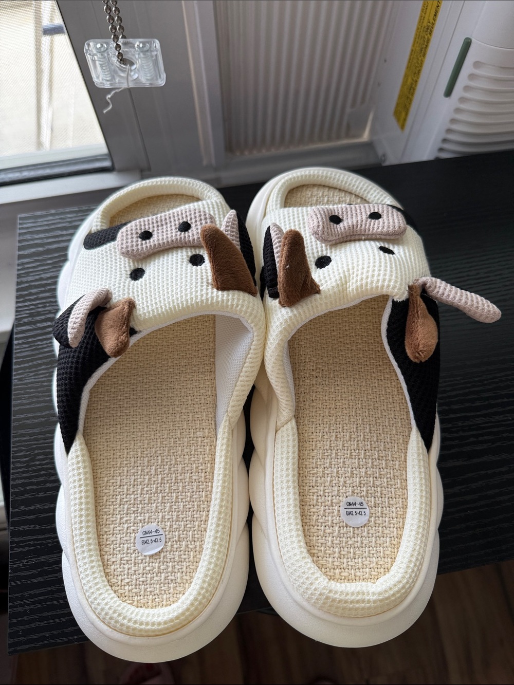 Cream and Black Cow Slip-On Shoes